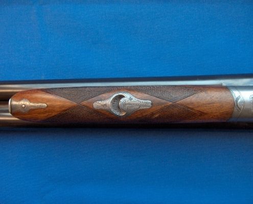 Carved Wood Shotgun Grip With Engraved Steel Inlays