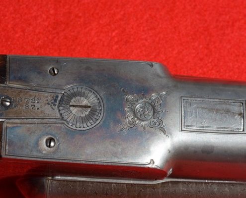 Underside of Shotgun with Engraving