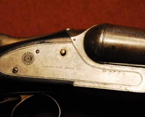 Close Up of a Shotgun Plus Engravings